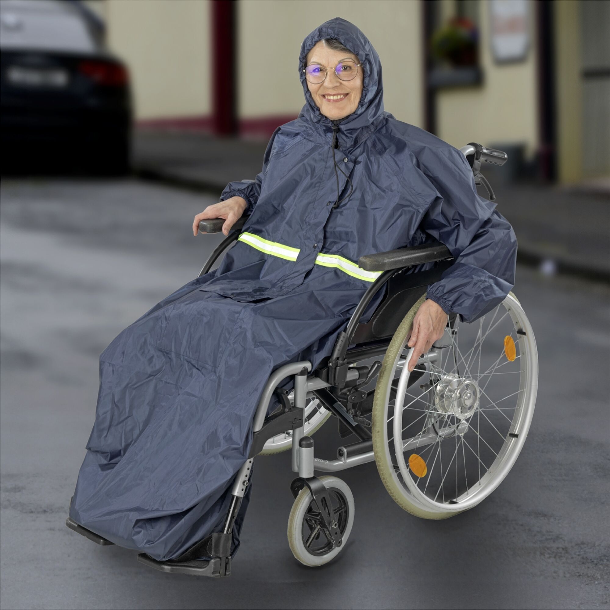 Rollstuhl-Regencape mit Ärmeln Rollstuhl-Regencape mit Ärmeln