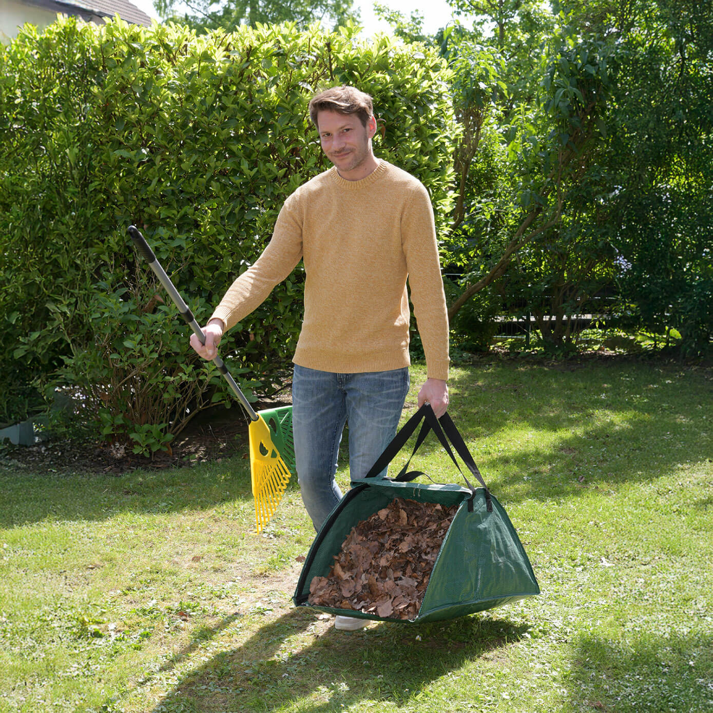 Leaf collector with sweeping edge